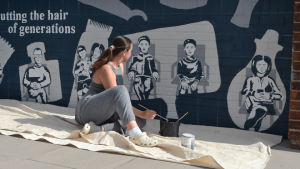 Chloe Norman celebrates three generations of customers of The Crop Shop in a new mural