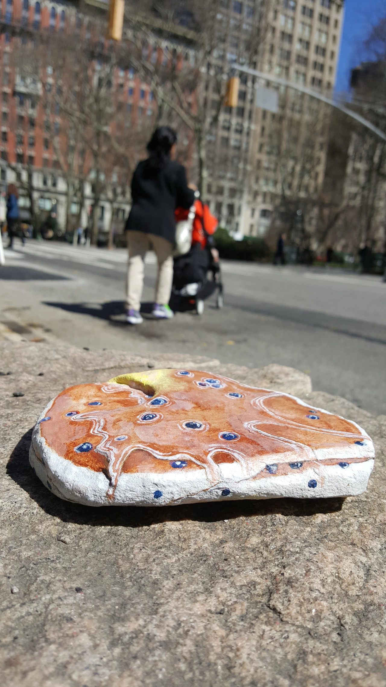 Elizabeth Saloka paints groceries and gadgets onto rocks – yep, rocks